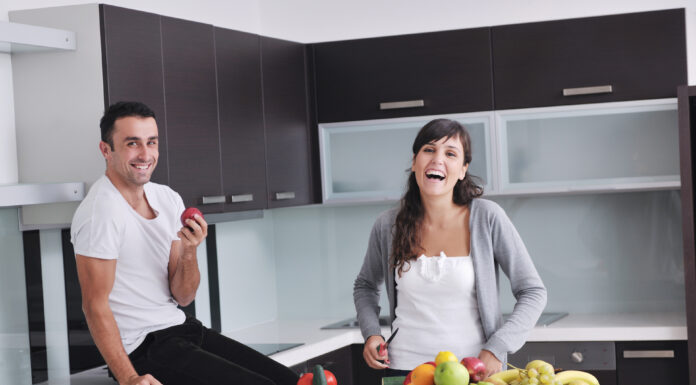 How Smart Lifestyle Habits Can Improve Work-Life Balance young couple have fun in modern kitchen