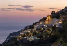 Inside Apotheca, the Amalfi Coast’s New Boutique Escape Furore Grand Hotel overlooking the Amalfi Coast at sunset