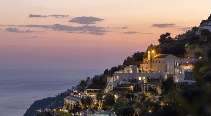 Inside Apotheca, the Amalfi Coast’s New Boutique Escape Furore Grand Hotel overlooking the Amalfi Coast at sunset