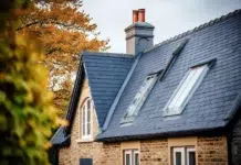 How Roof Repair Helps Prevent Small Roofing Problems From Becoming Major Expenses Modern Metal Roofing of a home. Vecteezy-medium