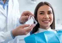 8 Best Invisalign Dentists in Toronto A customer getting her invisalign on with a Dentist in Toronto. Vecteezy-medium