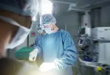 Recovering After Hernia Surgery: Activity, Wound Care, and Follow-Up Medical team performing a hernia surgery. Vecteezy-medium