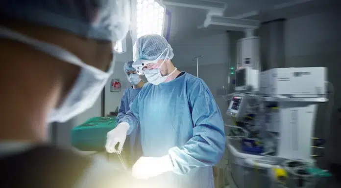 Recovering After Hernia Surgery: Activity, Wound Care, and Follow-Up Medical team performing a hernia surgery. Vecteezy-medium