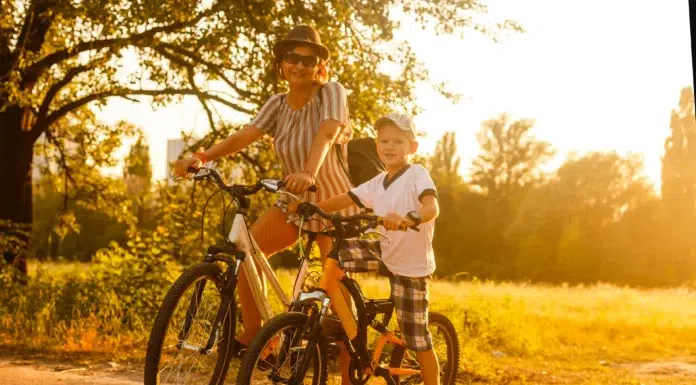 Electric Bike for Kids: Safety, Speed, and Age Guide Mom and son riding on electric bikes. Vecteezy-medium