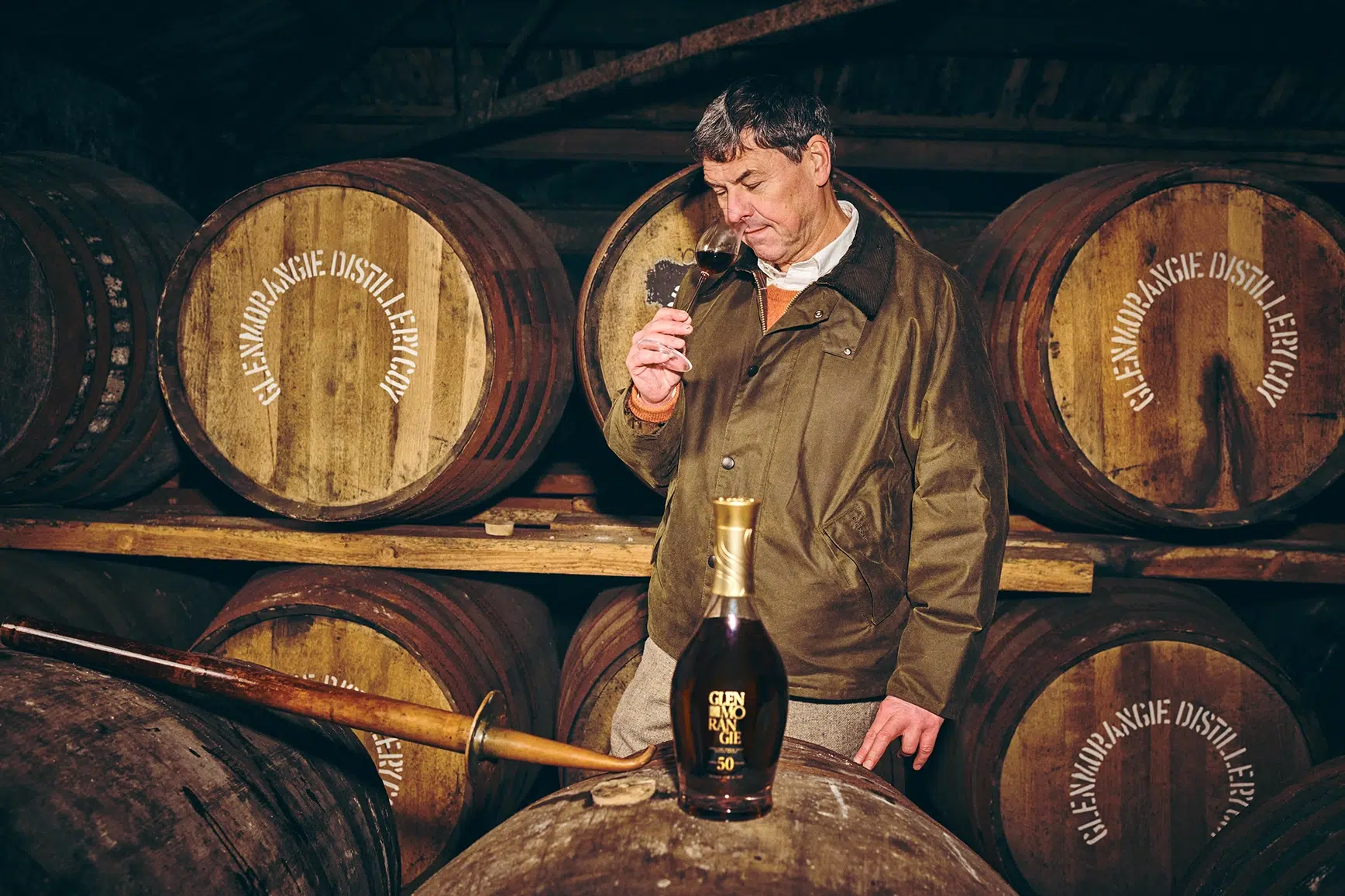 Dr. Bill Lumsden nosing Glenmorangie 50 Years Old whisky in the distillery warehouse Dr. Bill Lumsden nosing Glenmorangie 50 Years Old whisky in the distillery warehouse