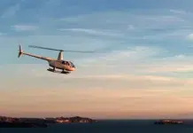 Making an Entrance at the Monaco Yacht Show hoper helicopter flying over the Greek islands