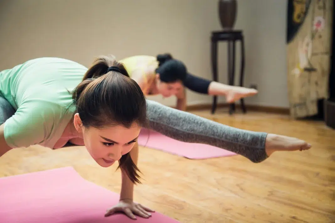Performing Pilates in London studio. Photo by Alex Shaw via unsplash Performing Pilates in London studio. Photo by Alex Shaw via unsplash