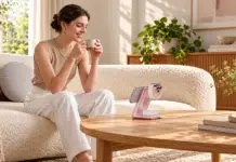 The Nightstand Has a Cable Problem Cozy Living Room with Pink Phone Stand