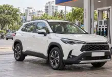 Hybrid Car Mileage and Running Costs: Is a Hybrid Worth It in India? Hybrid SUV at a Bengaluru Petrol Station