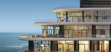 Terrace view of Penthouse A at Faena House with ocean backdrop during sunset